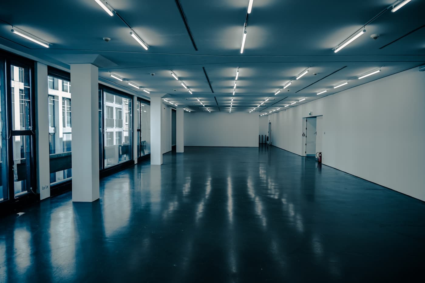 Bright showroom with high-gloss reflective epoxy floor