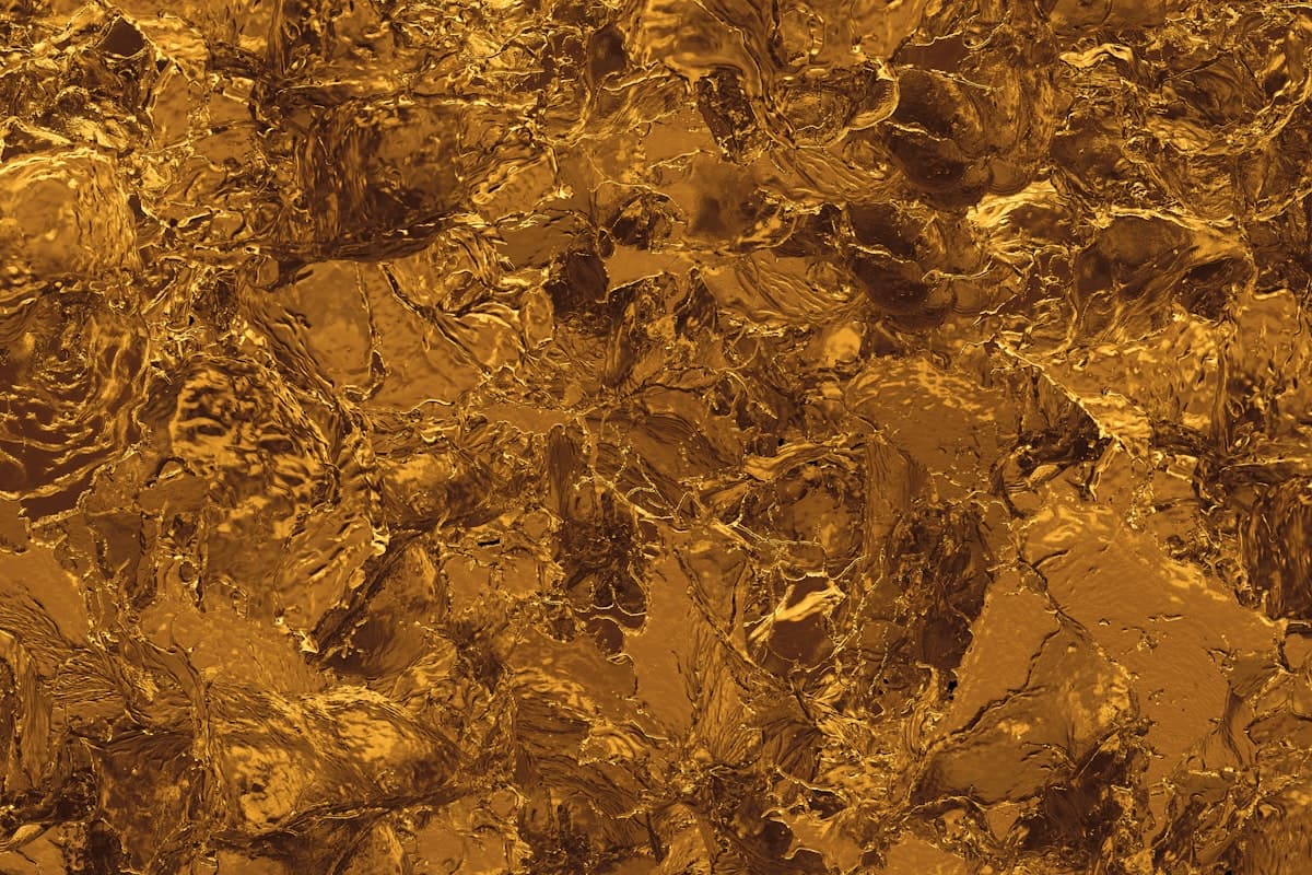 Metallic epoxy floor detail with bronze and charcoal swirl pattern