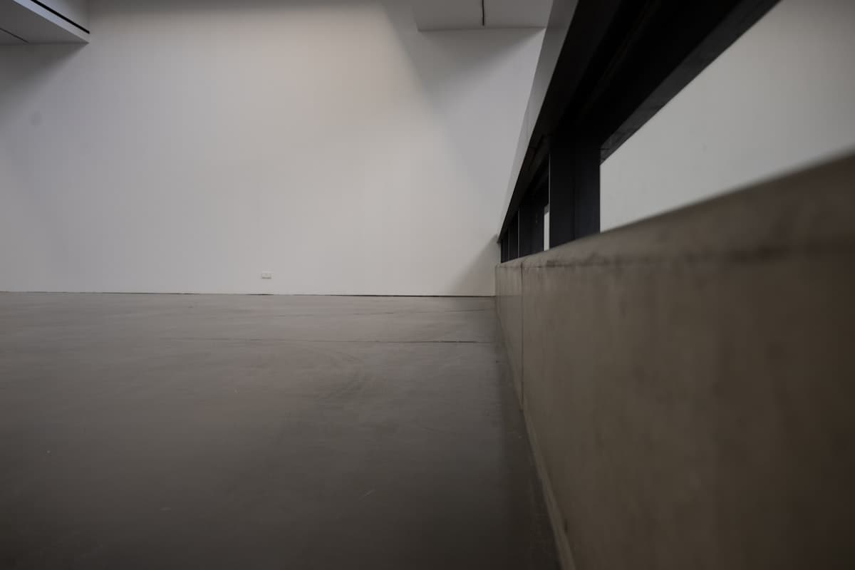 Bare concrete room prepared for epoxy coating